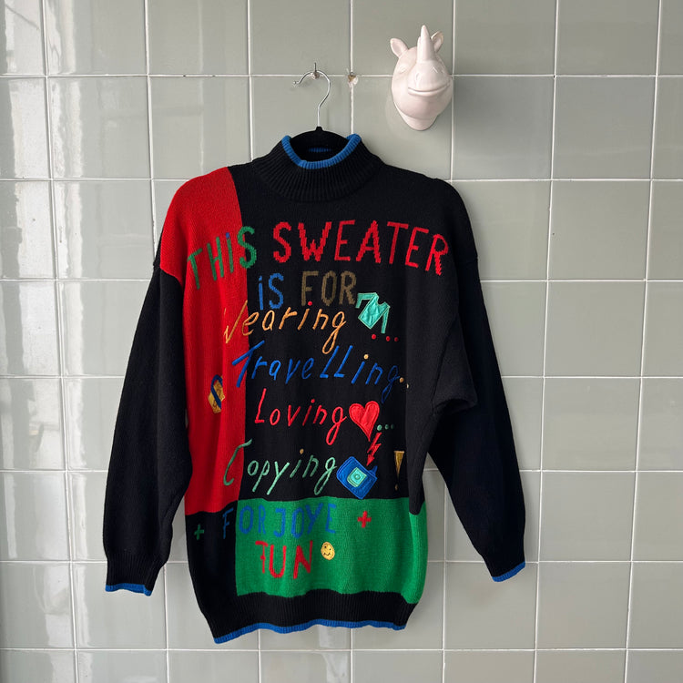 JERSEY BLACK SWEATER BORDADO MULTICOLOR