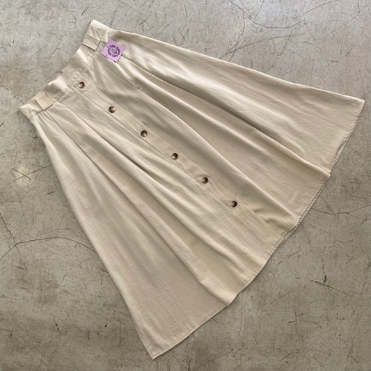 FALDA BEIGE MIDI BOTONES