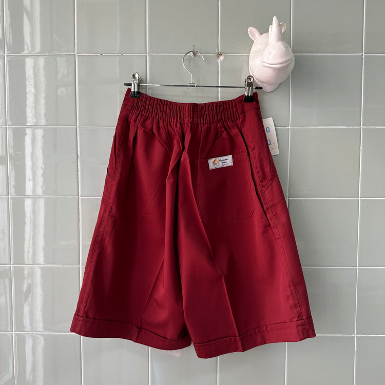 SHORT RED TRAJE GOMA