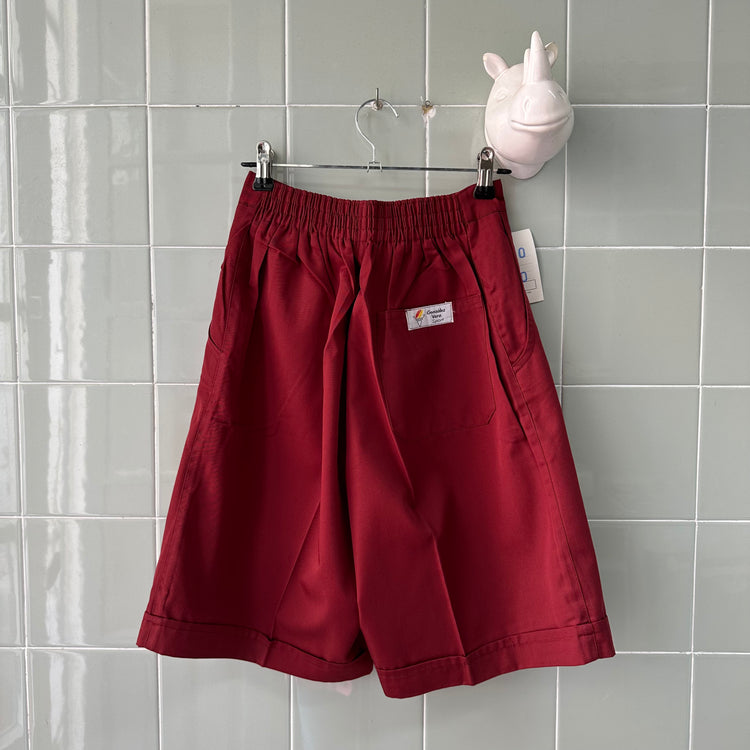 RED RUBBER SUIT SHORTS